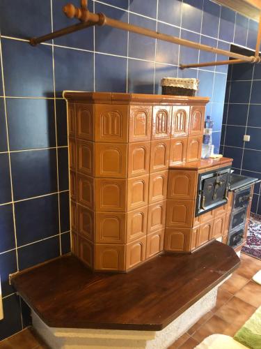 a model of a kitchen with a stove in a room at Ubytování v soukromí rodinné vily v Děčíně in Děčín