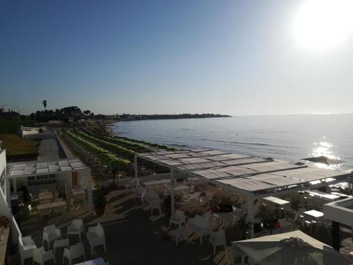 an aerial view of a beach with the water at Sun Holiday in Avola