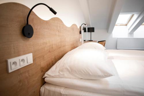Ein Bett oder Betten in einem Zimmer der Unterkunft Apartmány Koflík