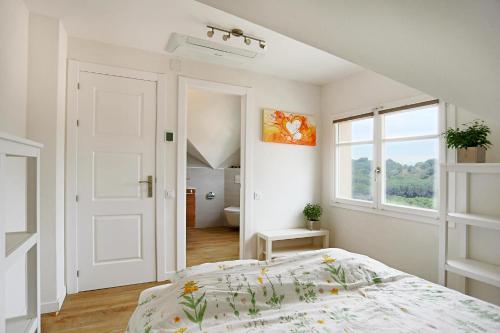 Postel nebo postele na pokoji v ubytování Homestay Villa Estrella - Costa Brava