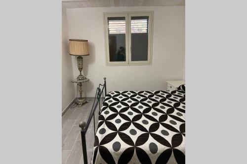 Una cama o camas en una habitación de Uliveto Nonno Giacomo