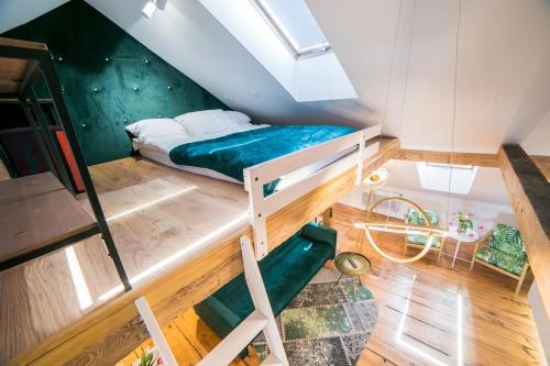 Posteľ alebo postele v izbe v ubytovaní Apartamenty Jęczmienna 29