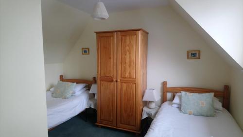 Cama o camas de una habitación en Auld Cross Keys Inn