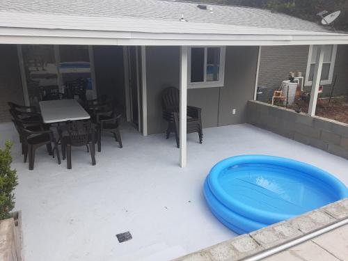 a blue frisbee sitting on a patio at Lovely oasis with private swimming pool 4,6,8 f deep in Gulf Breeze