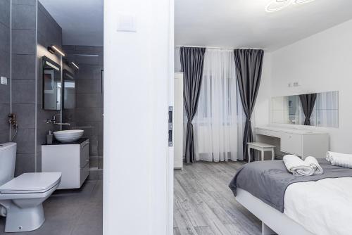 Ένα μπάνιο στο Cristopher Apartament