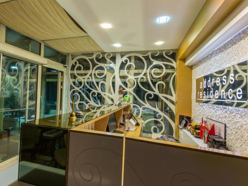 an office with a mural on the wall at Address Residence Suite Hotel in Antalya