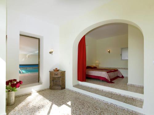 Кровать или кровати в номере Spacious detached villa on the Costa Blanca with heated pool and beautiful view