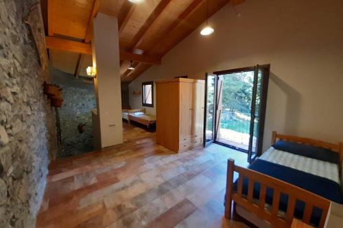 Posteľ alebo postele v izbe v ubytovaní Casa del Pont