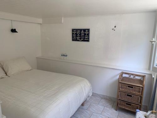Voodi või voodid majutusasutuse INTERLUDE omaha beach 50 m de la plage toas