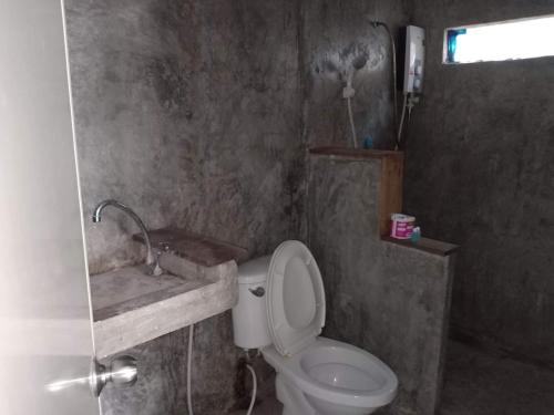 Kylpyhuone majoituspaikassa Patoo