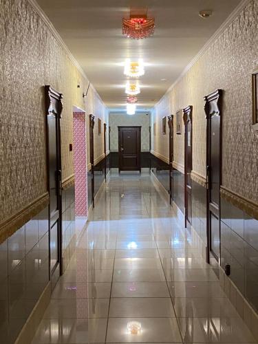 a hallway of a building with at Hotel Astam in Kostanay