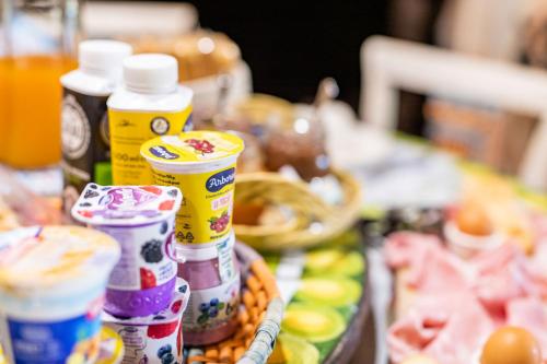 a table with some food and drinks on it at Villa Flumini in Flumini di Quartu