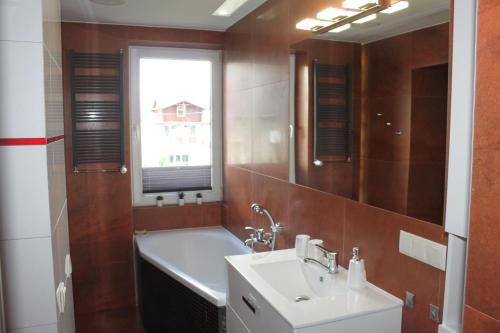 Koupelna v ubytování Apartament Night Premium Krakow
