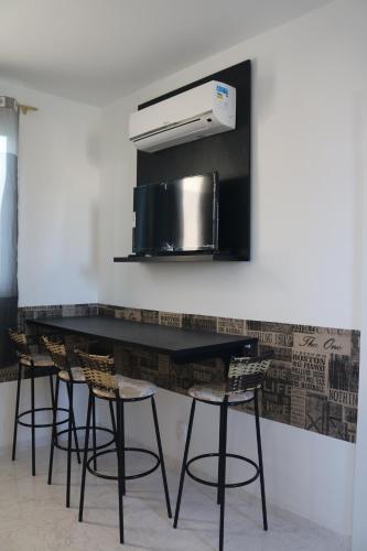 TV a/nebo společenská místnost v ubytování Nosso Cantinho Canasvieiras