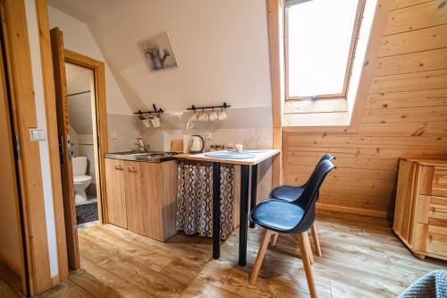 Kuchyňa alebo kuchynka v ubytovaní Apartament Stary Mlyn