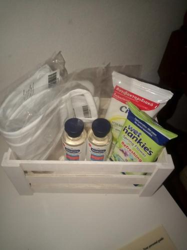 a drawer in a refrigerator with medicines and a bag at Yria Suite Zakynthos in Katastárion