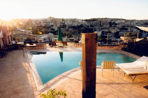 La alberca dentro o cerca de Kelebek Special Cave Hotel & Spa
