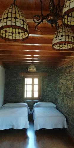 Ένα ή περισσότερα κρεβάτια σε δωμάτιο στο Casa con encanto