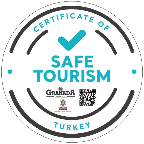 a logo for the certificate of safe tourism at Granada Luxury Belek - Family Kids Concept in Belek