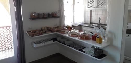 Maison Kainà tesisinde mutfak veya mini mutfak