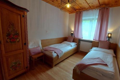 Кровать или кровати в номере Belle Air Lodge