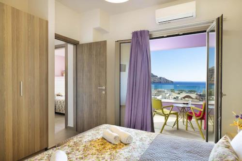 Postelja oz. postelje v sobi nastanitve Sea View Luxury Apartments