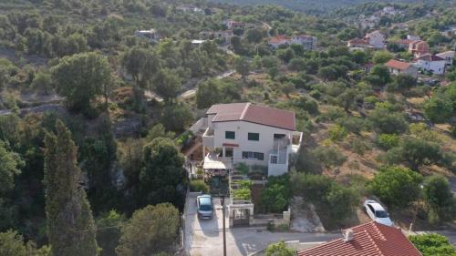an aerial view of a house in a residential neighborhood at Vila Ivana Dolores in Vinišće