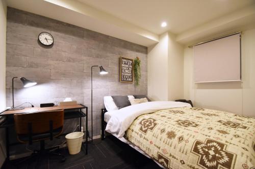 Giường trong phòng chung tại REGALO Shibaura - Vacation STAY 87447