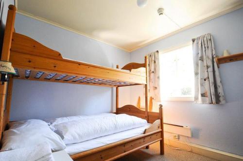 En eller flere senge i et værelse på Ullensvang Gjesteheim