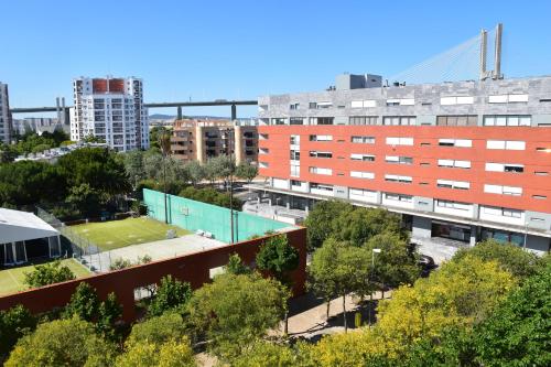 an aerial view of a city with buildings at Tagus Life Apartment in Lisbon