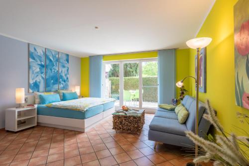 Ένα ή περισσότερα κρεβάτια σε δωμάτιο στο Ferienhaus Lütten Kulli - 2
