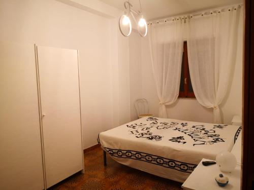 Postel nebo postele na pokoji v ubytování appartamento in villa a Pietragrande Villa Mi Vida