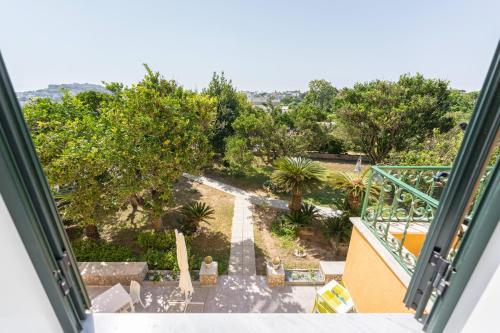a view from a window of a garden at Villa Caterina b&b in Procida