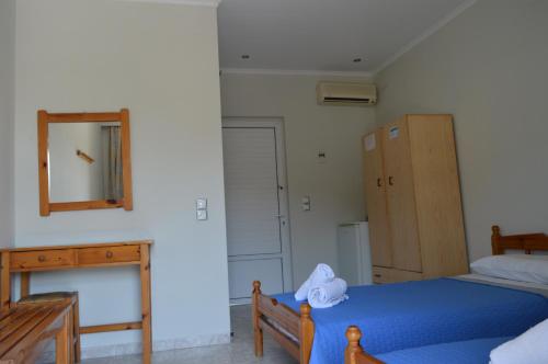 Ένα ή περισσότερα κρεβάτια σε δωμάτιο στο Billy's Rooms