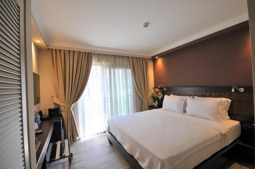 Resa Hotel Göcekにあるベッド