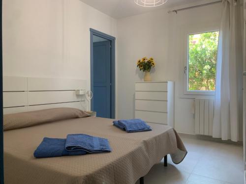 Ένα ή περισσότερα κρεβάτια σε δωμάτιο στο Bona Ciurrata