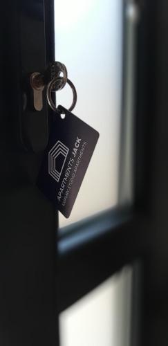 a key chain is attached to a door at Apartments Jack in Bihać
