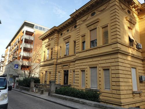 a building on the side of a street at Apartment Sea Promenade - Opatija center in Opatija