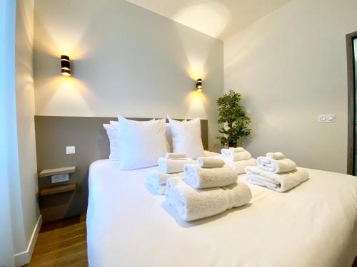 Voodi või voodid majutusasutuse Maxim - Easy Home Booking toas