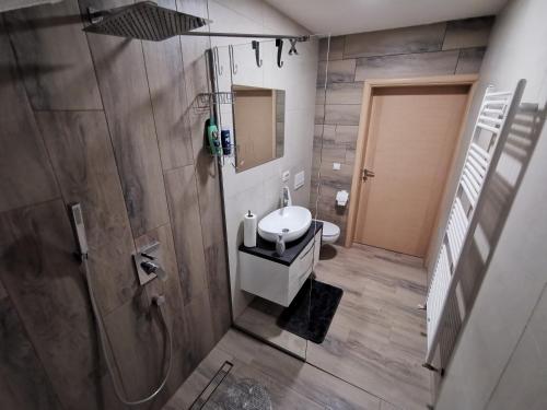 Koupelna v ubytování Apartman Božur ****