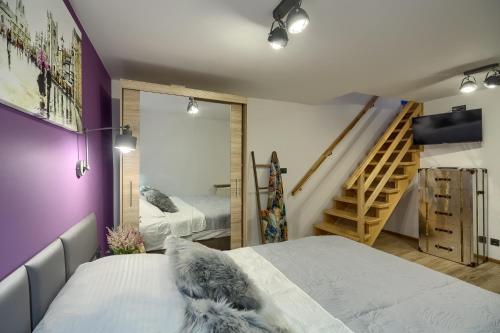 Кровать или кровати в номере BORYS Garaż na rowery i narty