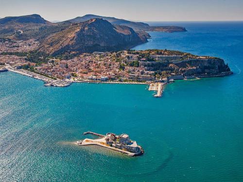 an island in the middle of a body of water at ELENI's House-Near the Old Railway Station in Nafplio