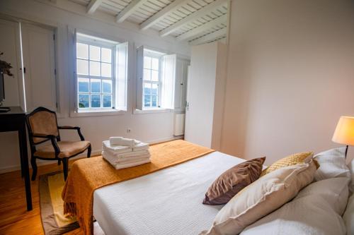 Кровать или кровати в номере Casa d' Avó Marcelina - Casas de Campo