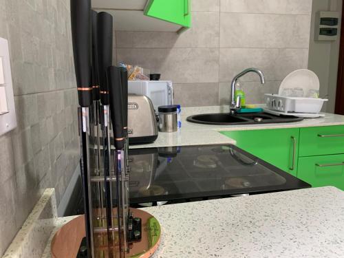 Η κουζίνα ή μικρή κουζίνα στο Pavema Apartments