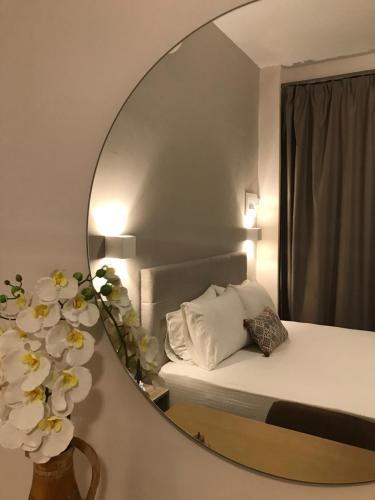 Katil atau katil-katil dalam bilik di Galini Apartment's-Suites