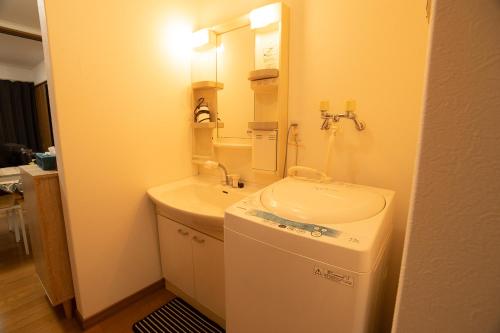 Et badeværelse på Hakodate cozy house w/parking