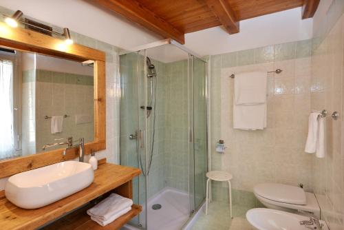 Ванная комната в Antiche Rive Holidays Apartments