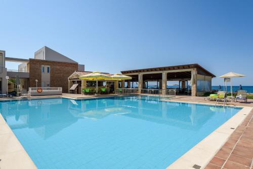a large swimming pool with blue water at Kostakis Beach in Gerani Chanion