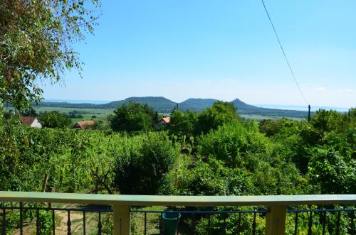 a view from the deck of a house with trees at Grand Cru 3. Vendégház in Hegymagas