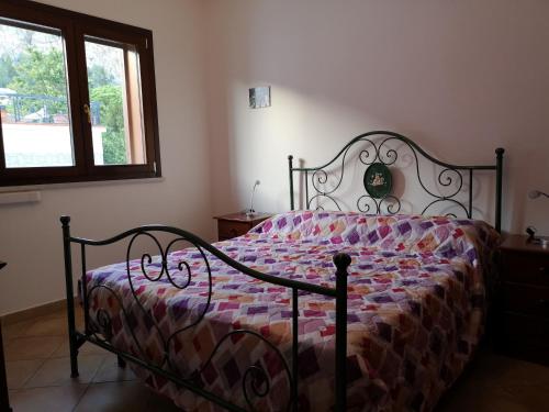 En eller flere senge i et værelse på La Casetta della Musica